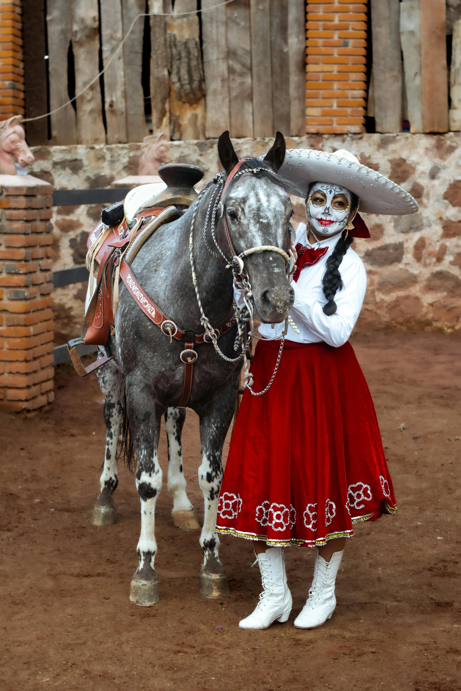 a costumed horse and mexican girl wearing masks