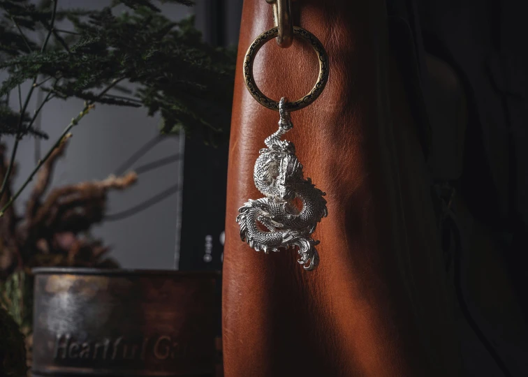 the handle on a purse is decorated with crystals