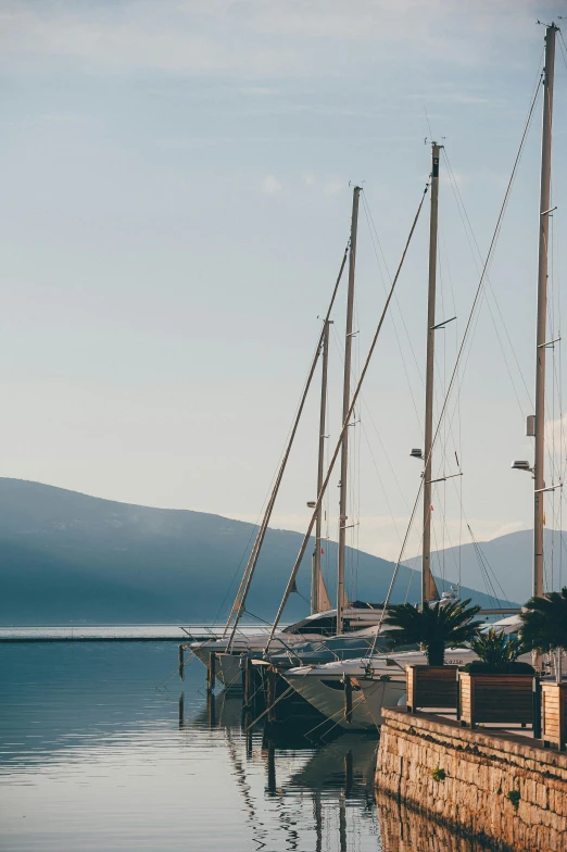 a boat sits on a dock with a water front