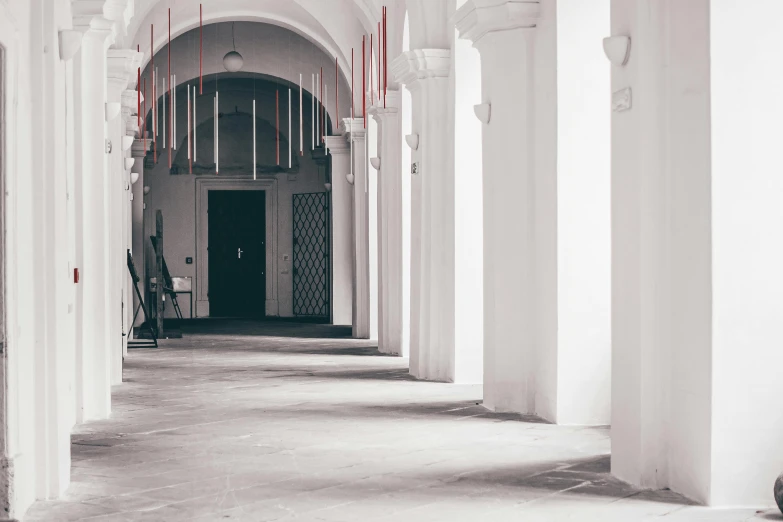 a large hallway that has an old door