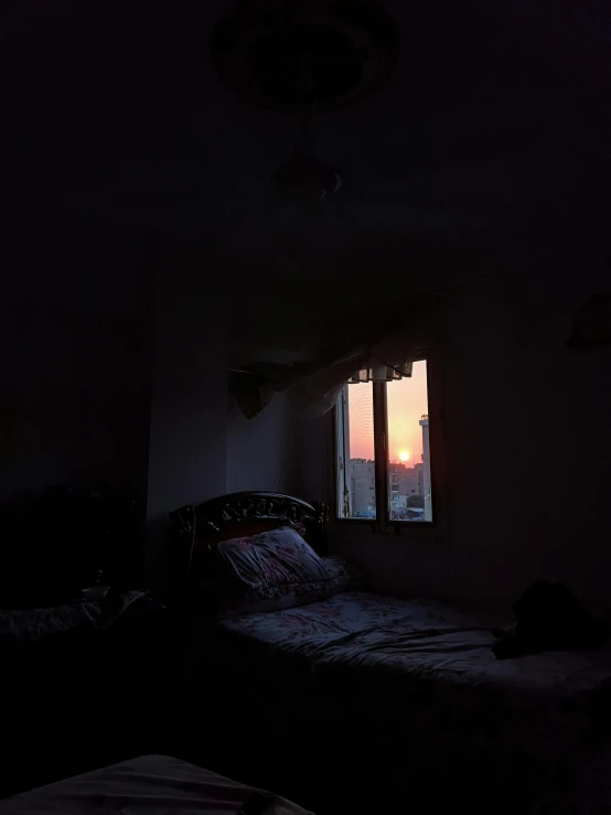 an image of a bedroom setting in the night