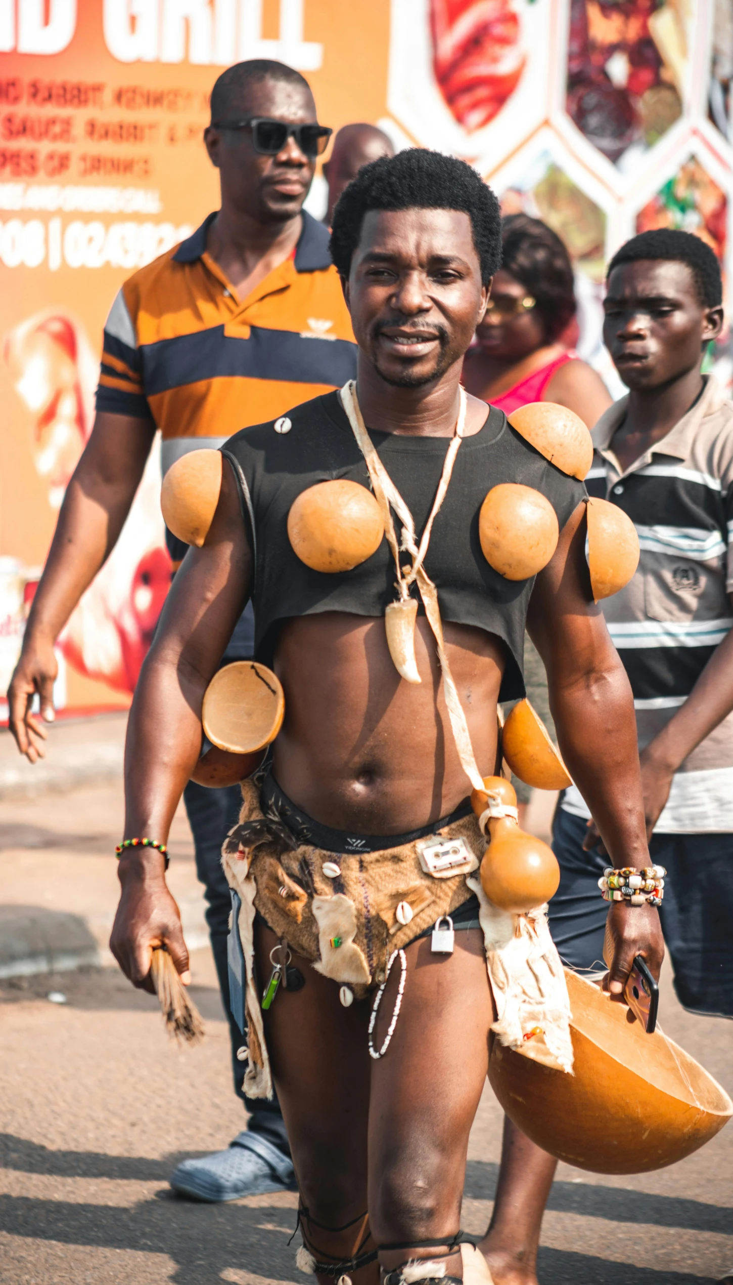 the man is wearing an elaborately decorated costume