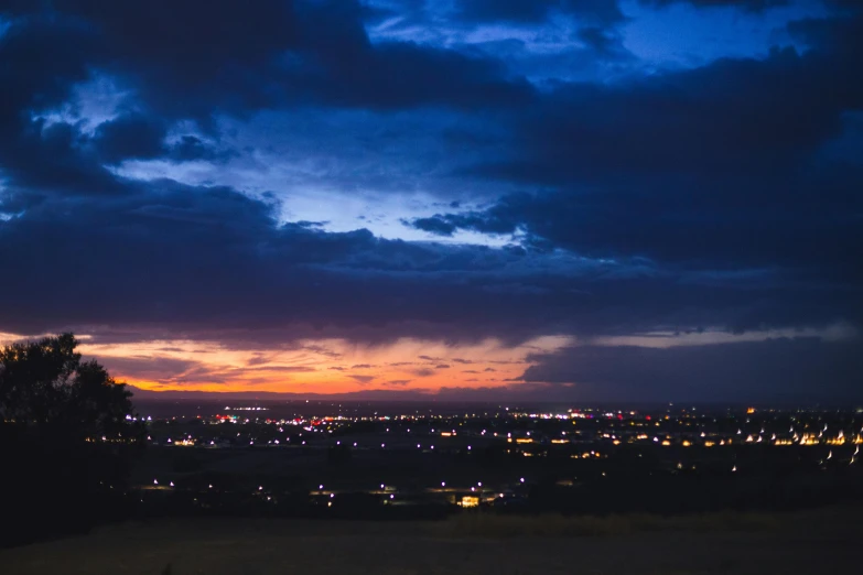 clouds that are covering the sky at night