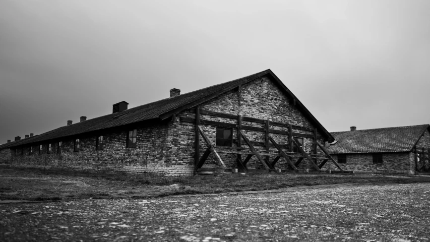 a rustic barn stands alone in the country