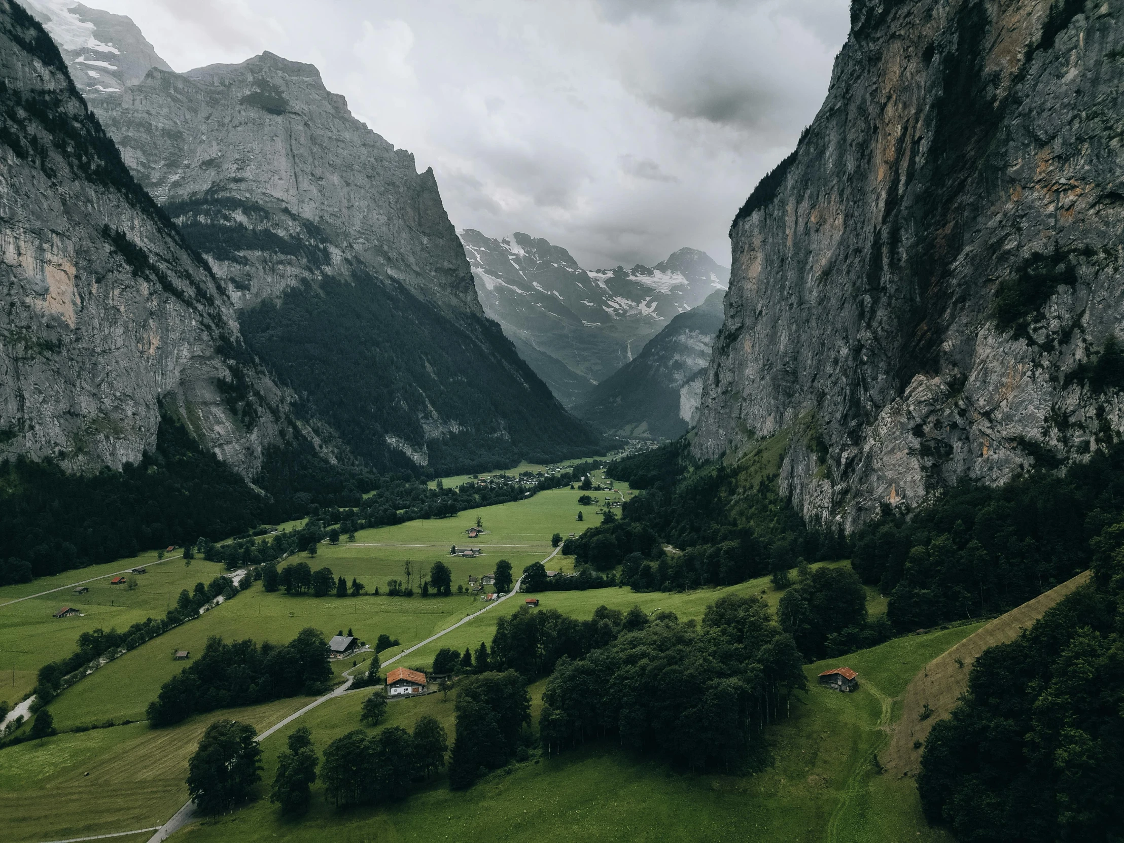 a scenic image of some mountains and a valley