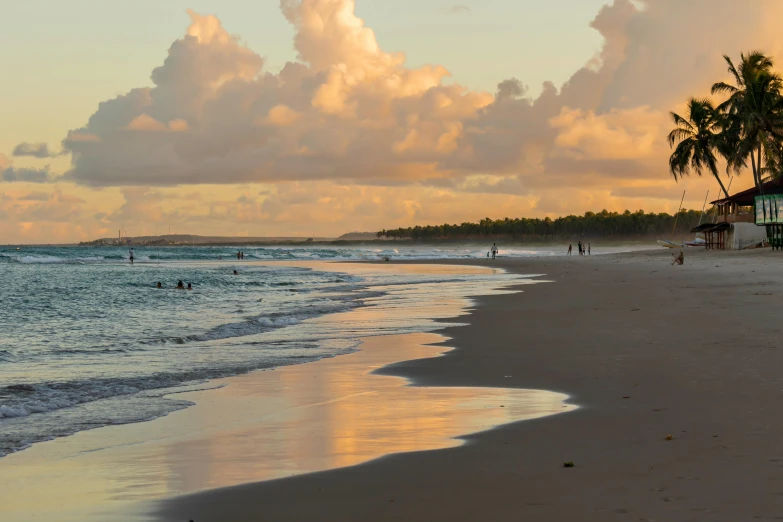 clouds in the sky over a sandy beach