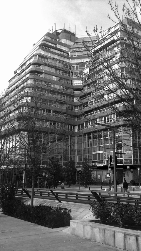 an office building under construction in black and white