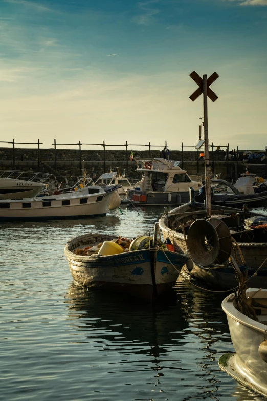 a bunch of small boats parked next to each other