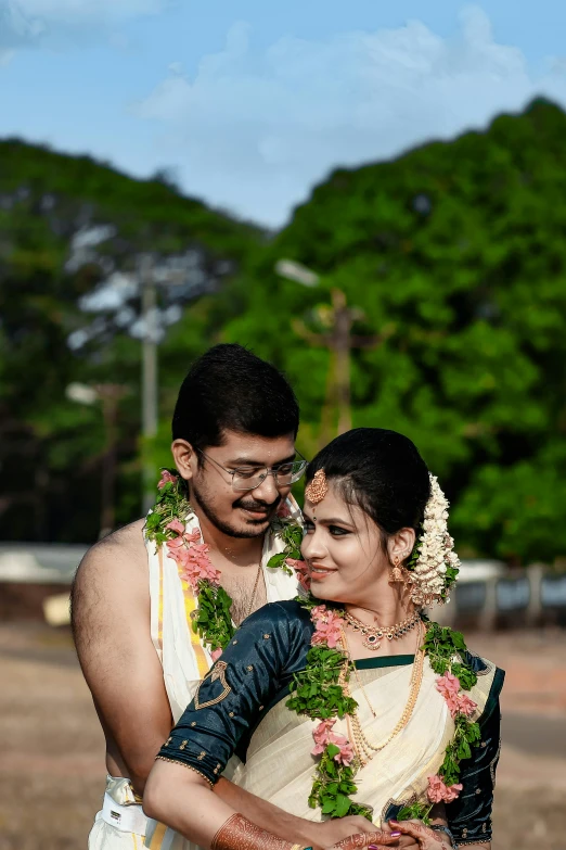 bride and groom in traditional indian wedding attire