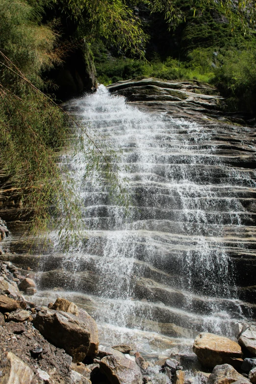 the water is flowing out of the stream