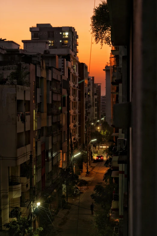 the city streets are lined with tall buildings