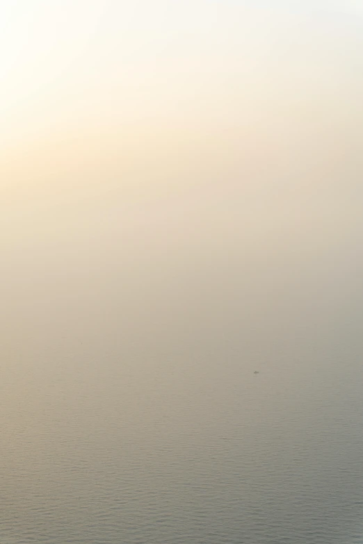 a very long boat floating through the ocean