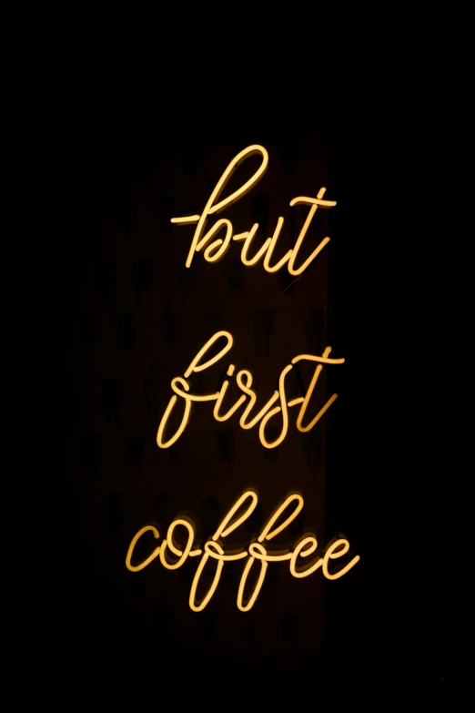 a neon sign that says but first coffee