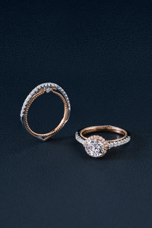 two diamond ring, one in two different shapes and one in three different sizes