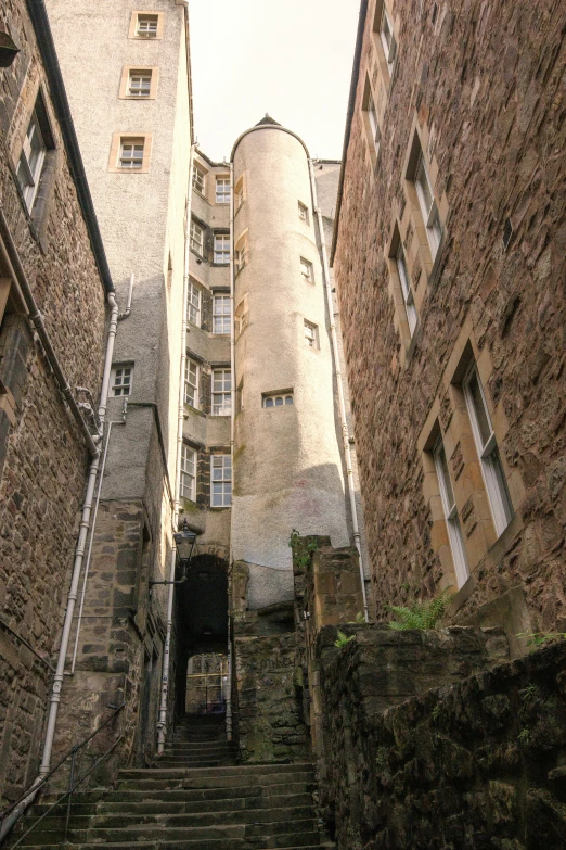 a bunch of buildings that are in the middle of a street