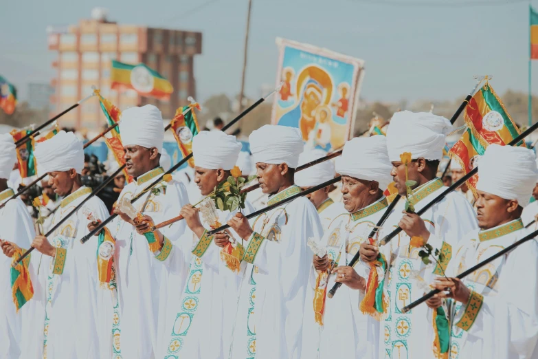 a group of people are performing traditional dance