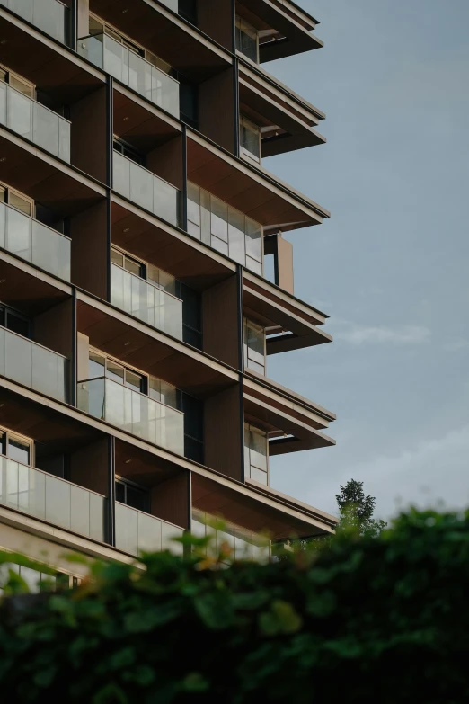 a building with balconies and several windows is pictured