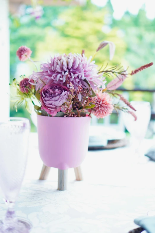 some pretty flowers in a vase on the table