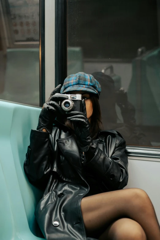 a woman on a train looking out of the window