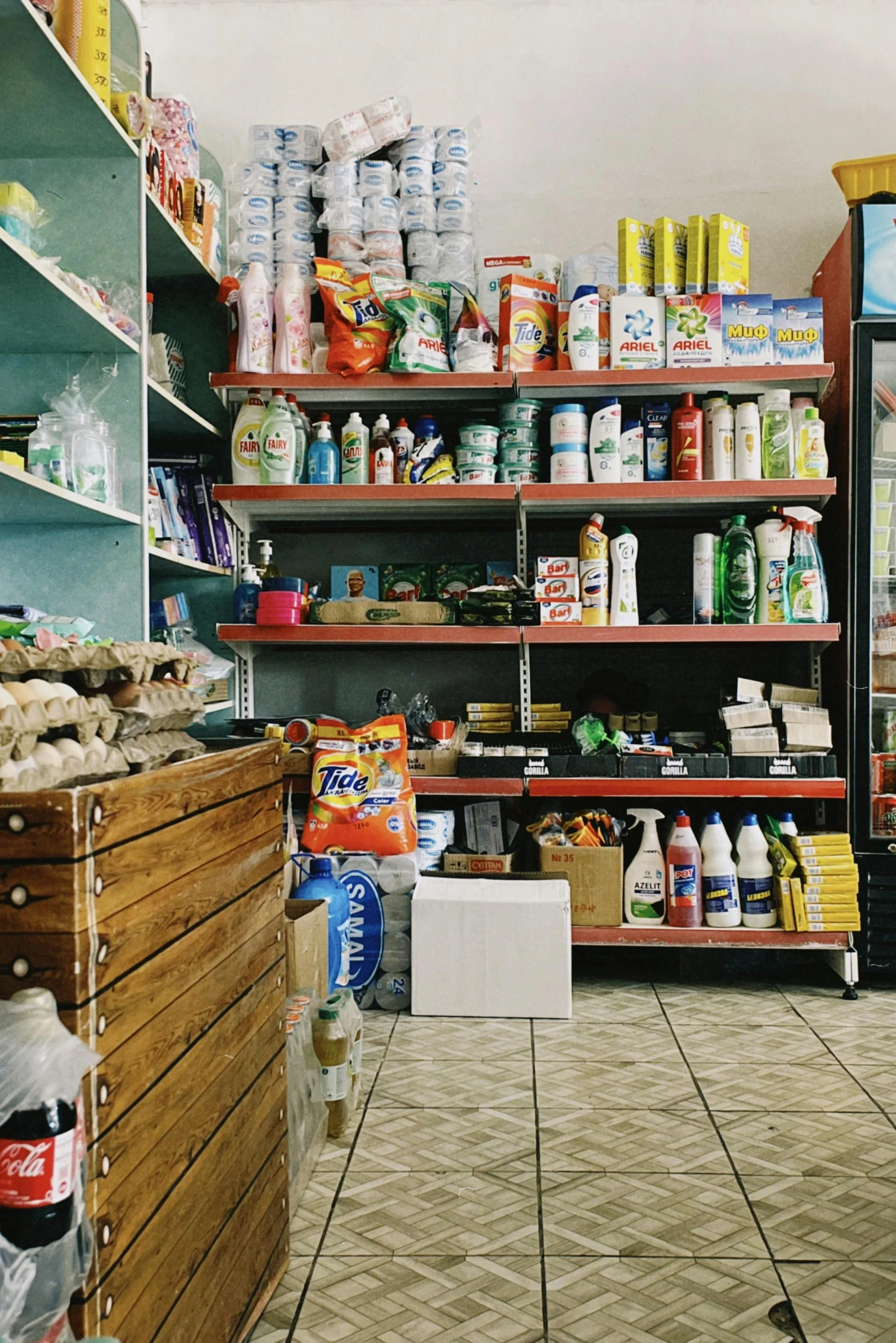 shelves and drawers in a store filled with condiments