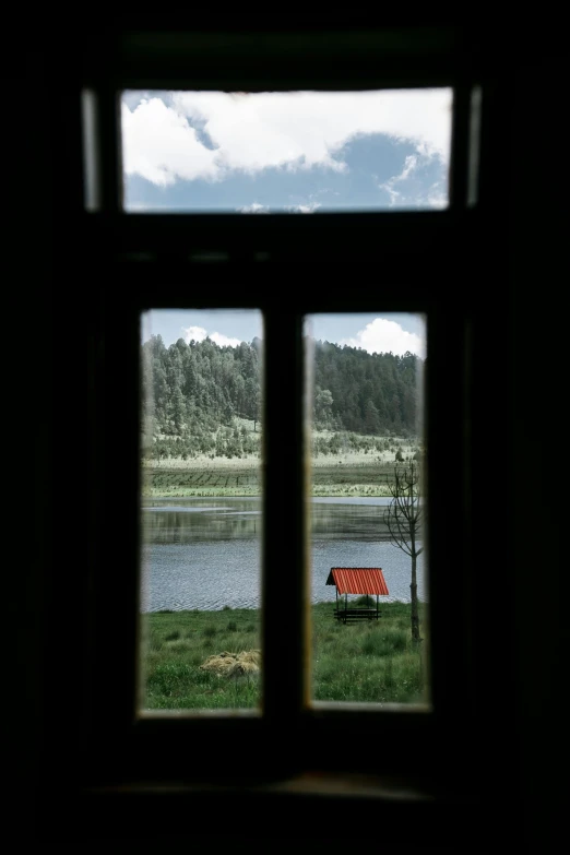 a window that has a view of a lake