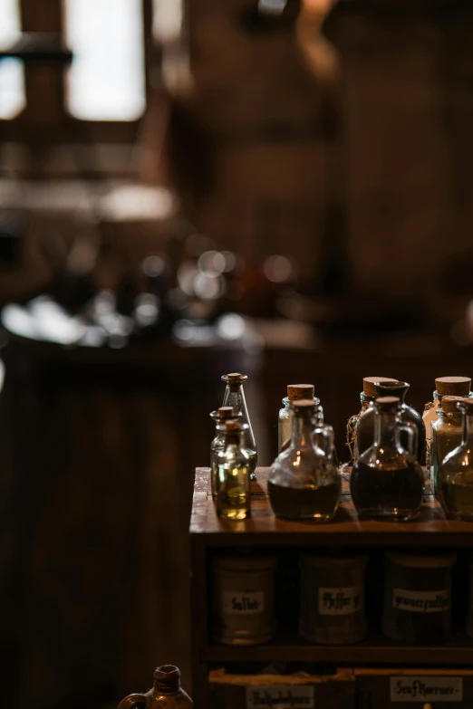 miniature bottles of liquor sitting on top of a wooden box