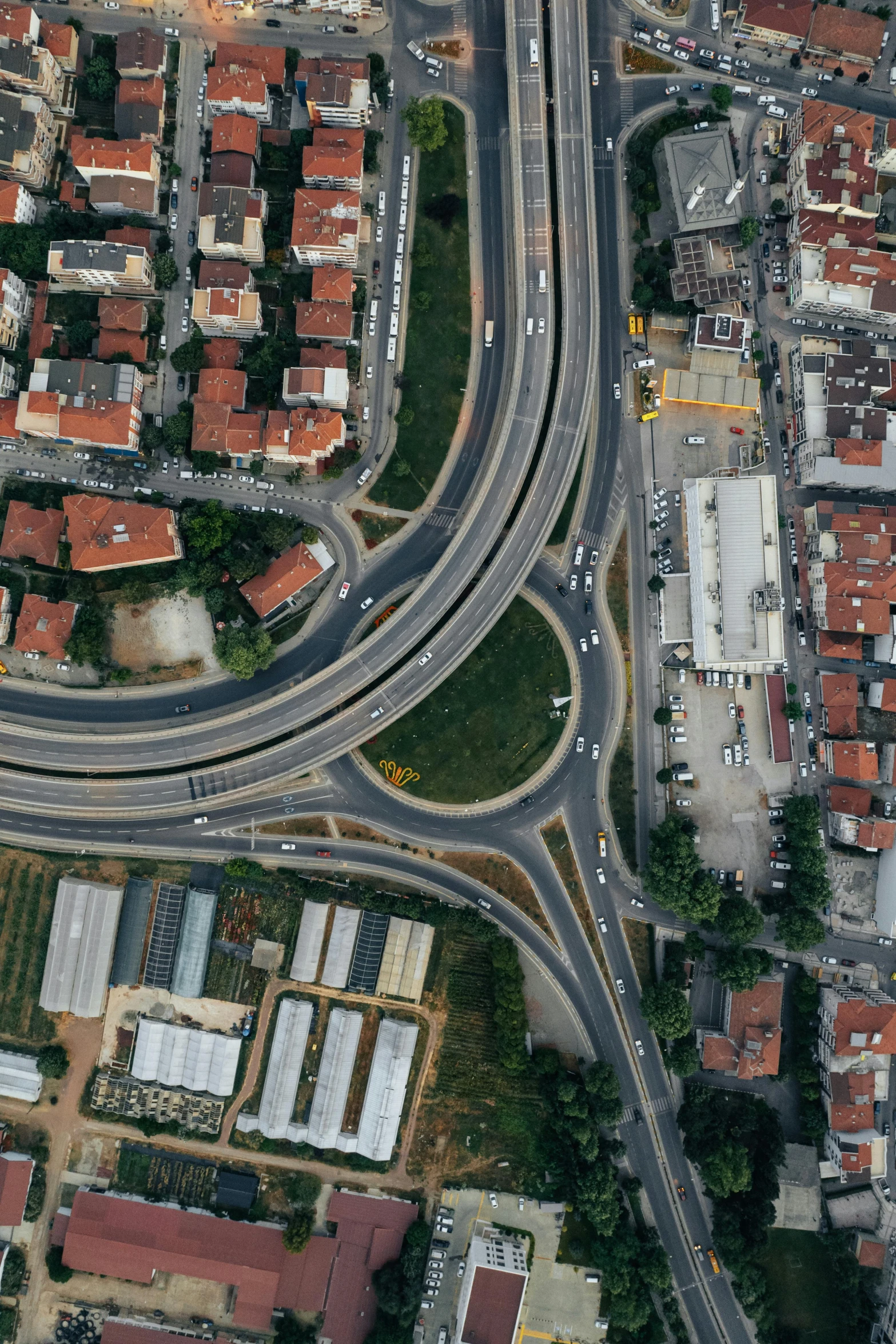 an aerial view of a large intersection with many cars