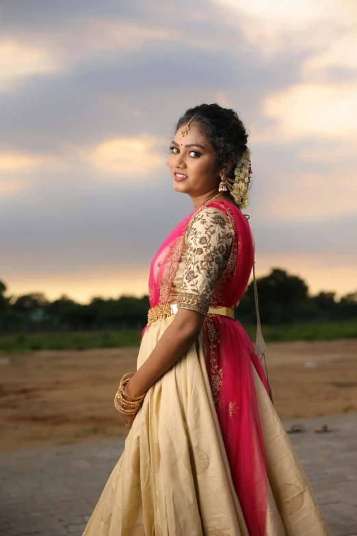 young woman dressed up in an indian traditional dress