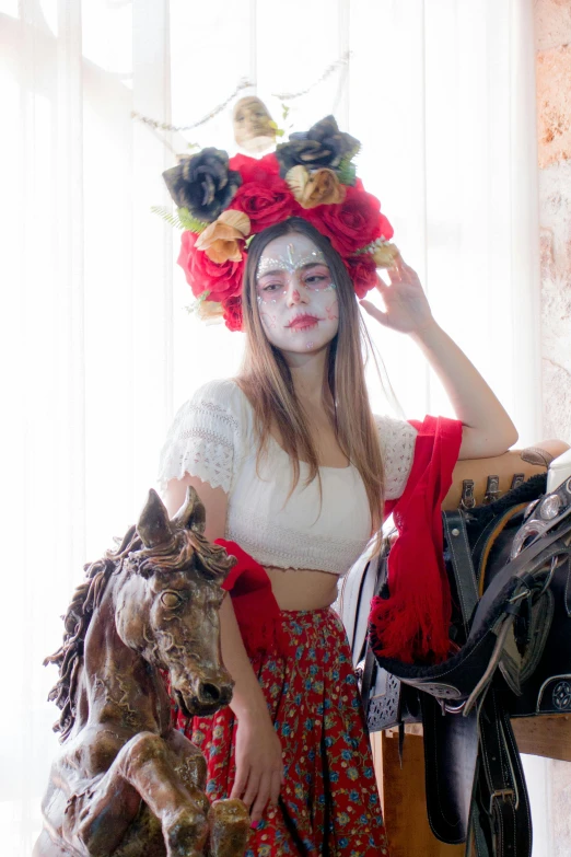 girl wearing makeup sitting on horse in front of window