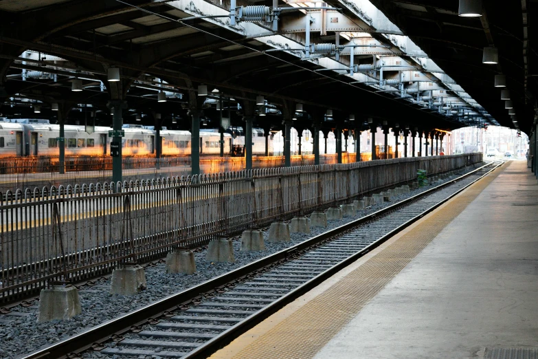 a long train is stopped on the tracks