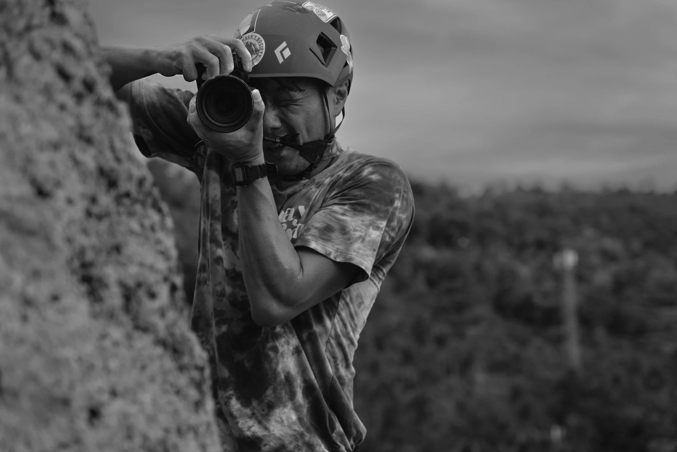 a man with a helmet taking a po