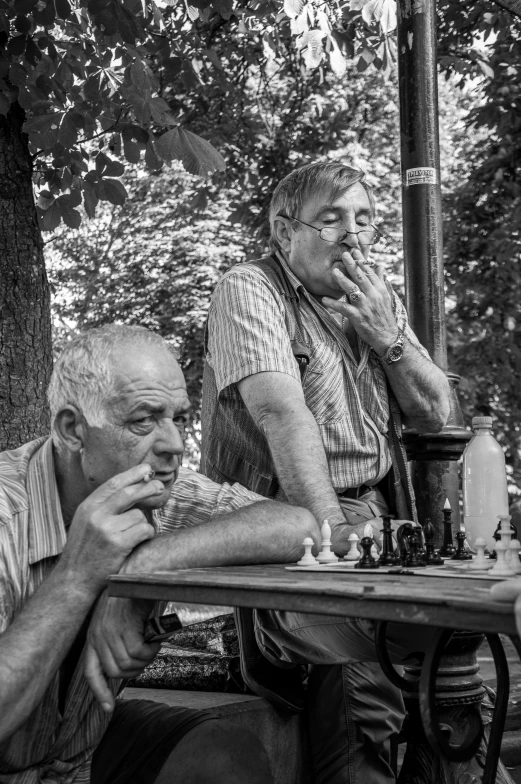 a man and woman playing a game of chess