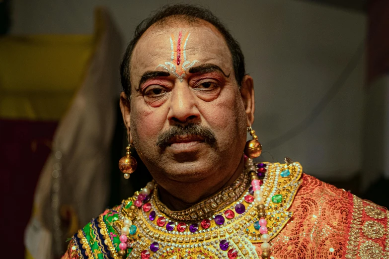 a man dressed in a very elaborate costume