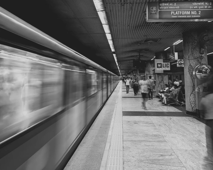 people are waiting at the train station