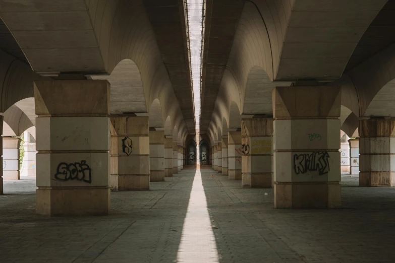 the walkway has some graffiti on it