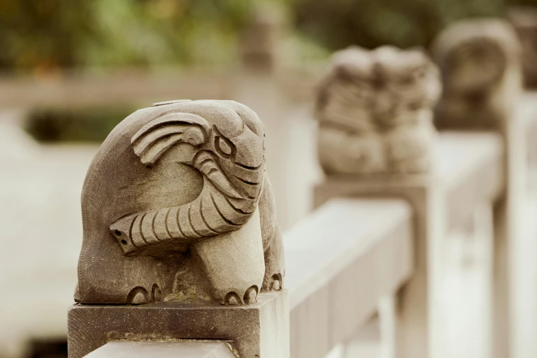 an elephant statue with ornate ornaments around it