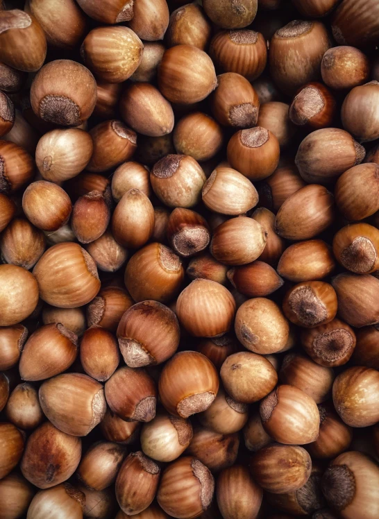 an overhead view of nuts gathered in a pile
