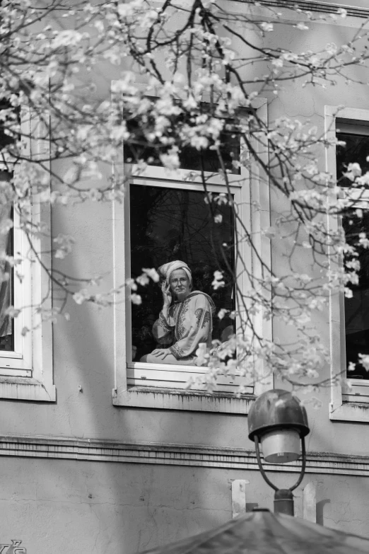 an old po of two women in the window