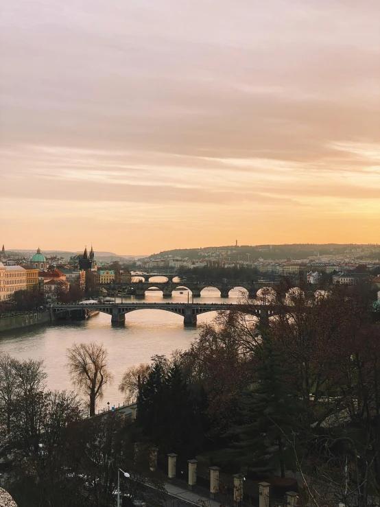 there is a view of a river and bridge in the distance