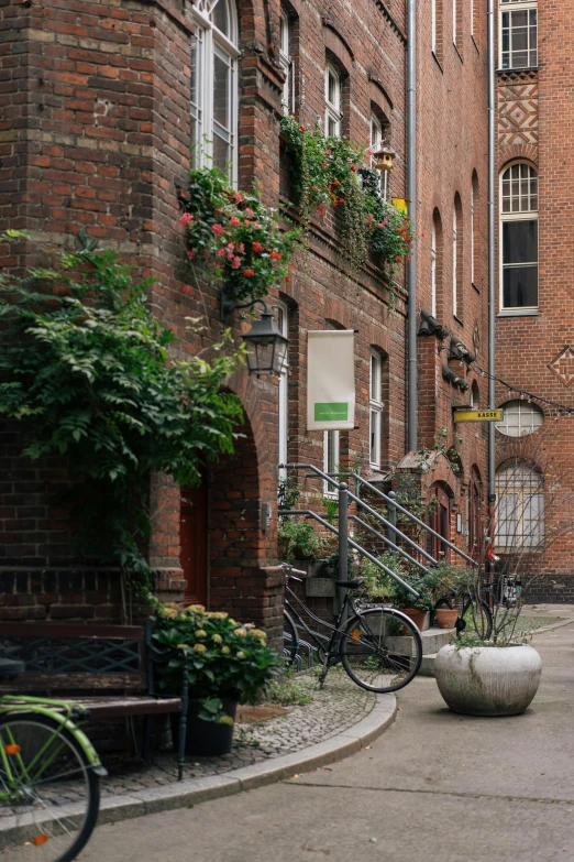 some buildings and bikes parked on the sidewalk