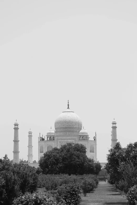 a large building with pillars and a dome