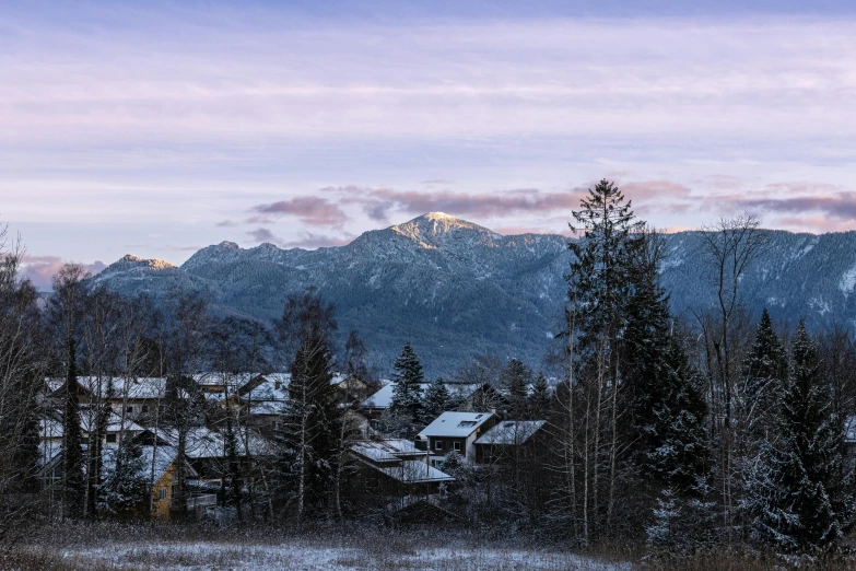 a view of the mountains from an area of snow