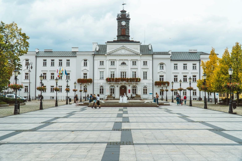 a large building with a tall clock tower at the top