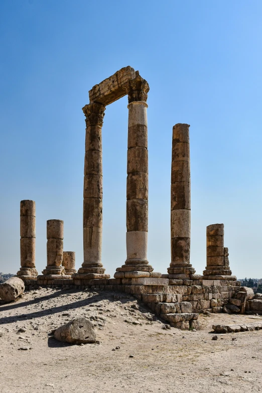 two very old, large ruins sitting in the middle of the desert