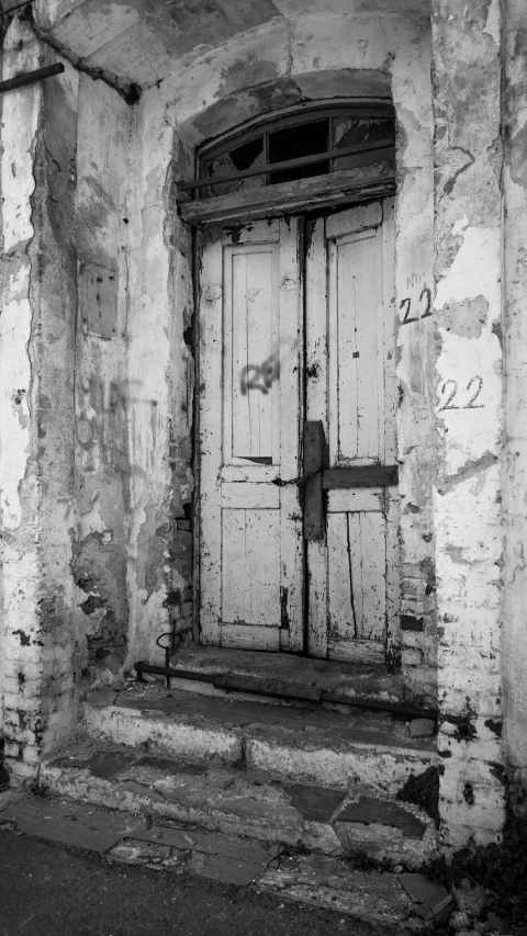 an old wooden door in a stone wall