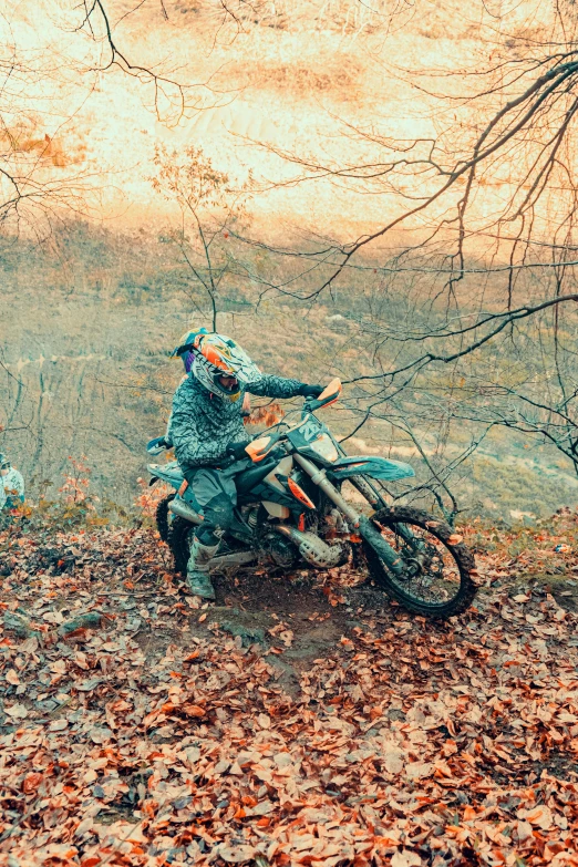 a man sitting on top of a motor bike