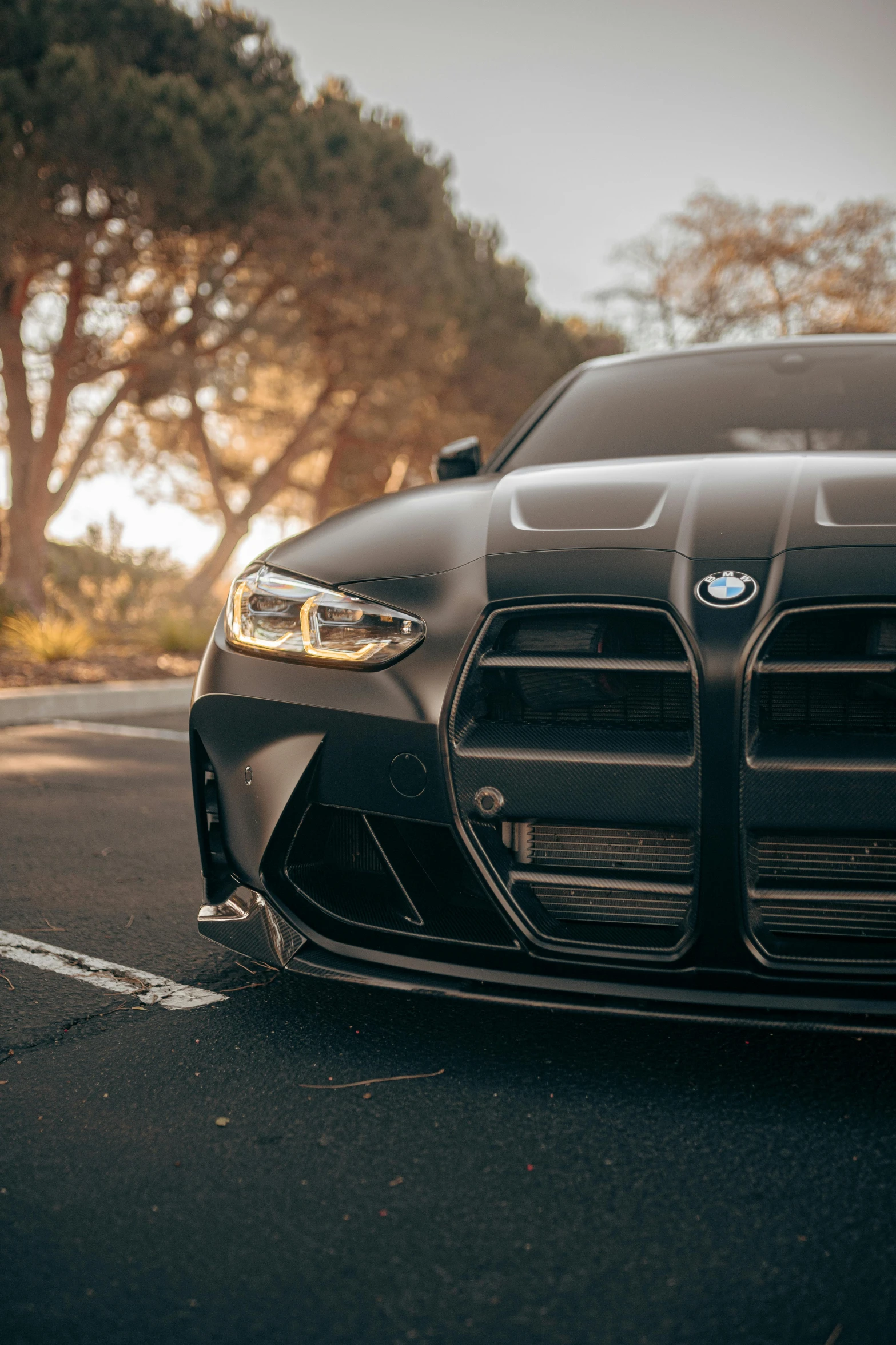 a black sports car parked on the side of a road