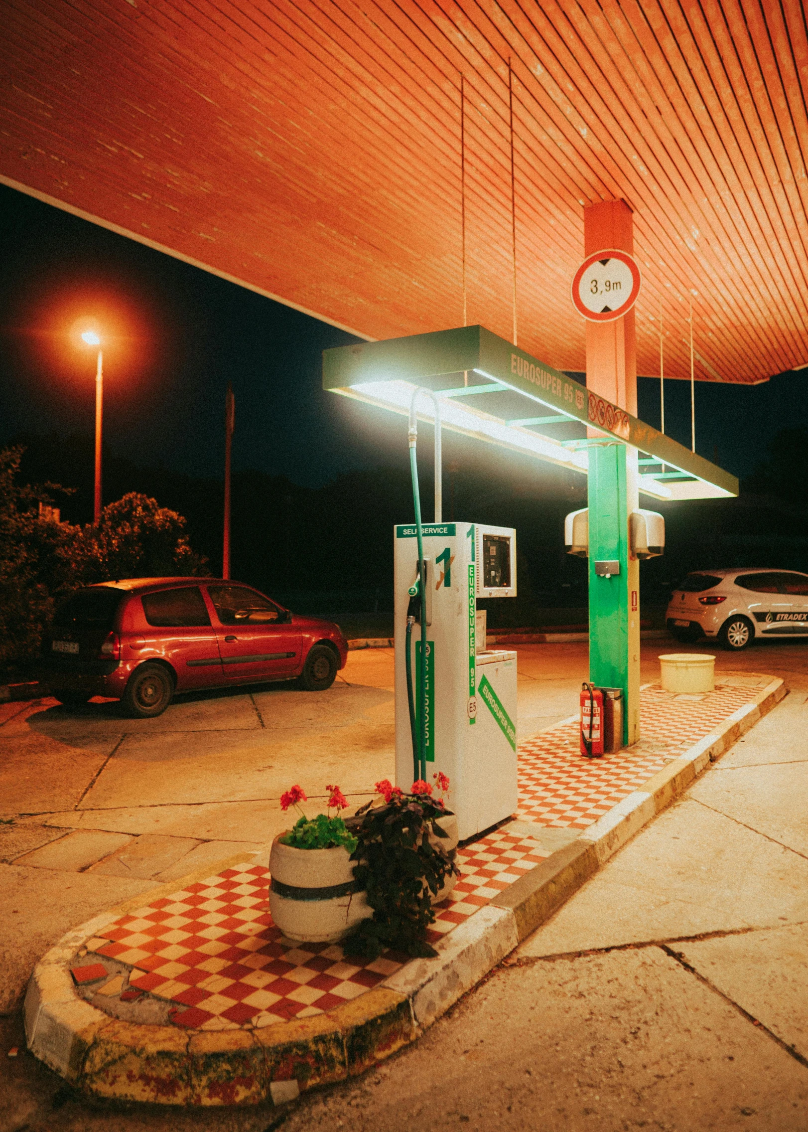 an image of an empty gas station with checkered tablecloth