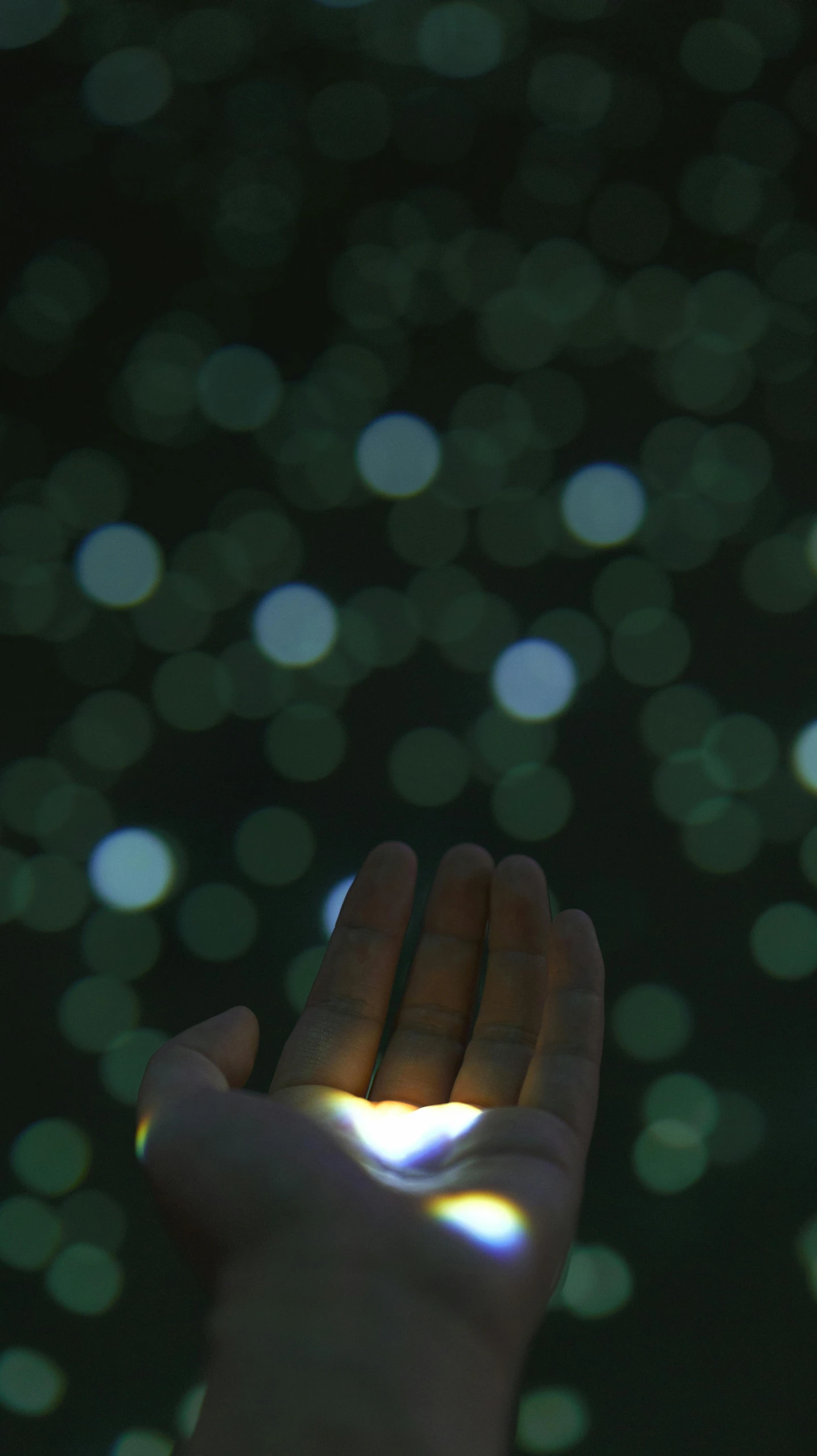 a close up of a person holding a cell phone