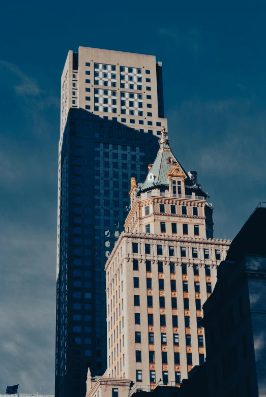 the top of an old, elegant building in new york city